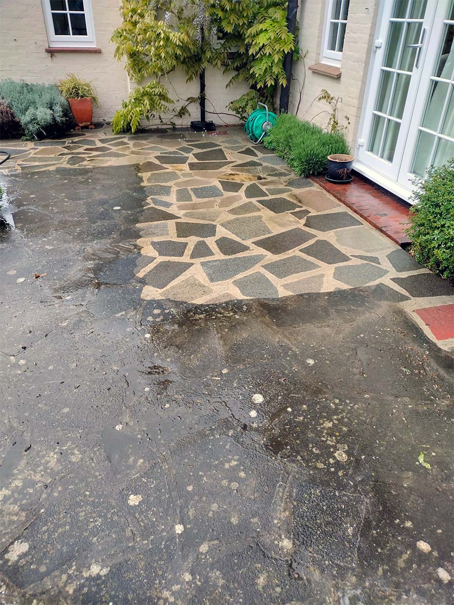 Jet washing a patio